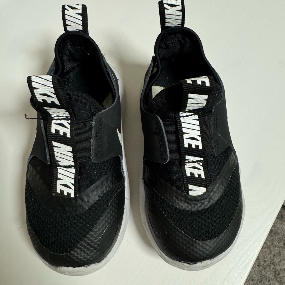 Nike Black and White Slip-On Sneakers